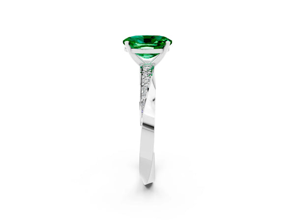 White gold Oval Cut Emerald Engagement Ring with Side Stone Accents and Four-Prong Setting