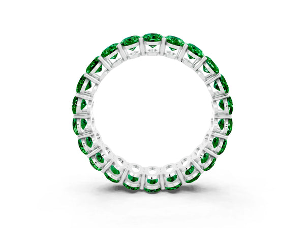 White gold Oval Cut Emerald Eternity Band with Shared Prong Setting