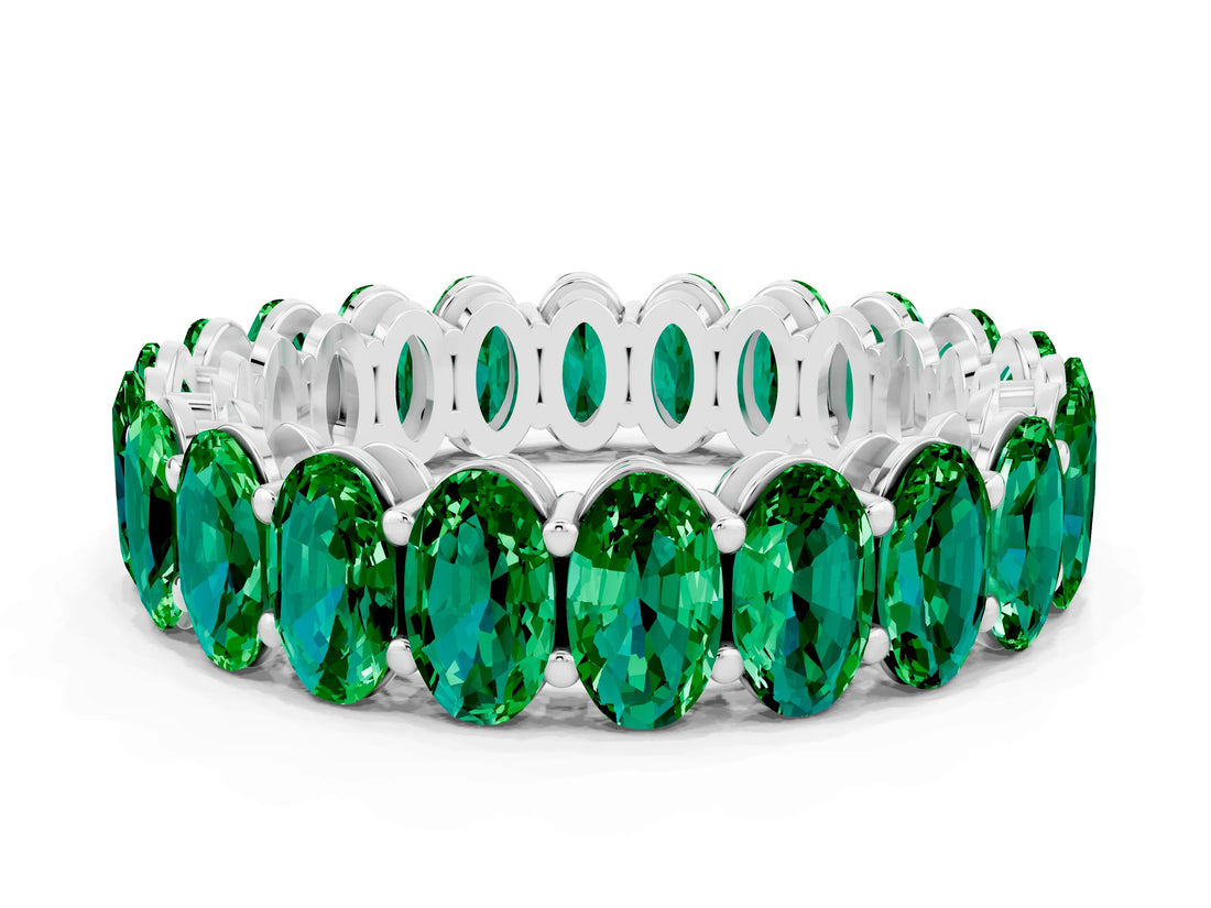 Silver Oval Cut Emerald Eternity Band with Shared Prong Setting