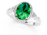 White gold Oval Cut Emerald Halo Ring with Tapered Band and Four-Prong Setting_1