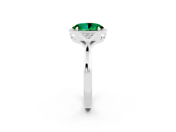 Silver Oval Cut Emerald Halo Ring with Tapered Band and Four-Prong Setting