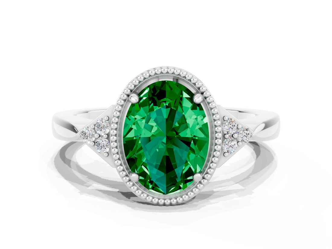 White gold Oval Cut Emerald Halo Ring with Tapered Band and Four-Prong Setting