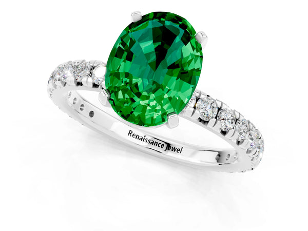 Platinum Oval Cut Emerald Pavé Solitaire Ring with Round Band and Prong Setting