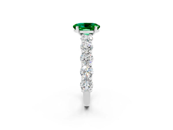 Platinum Oval Cut Emerald Prong Setting with Side Stones on a Pave Band