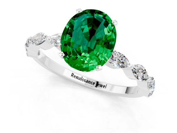 White gold Oval Cut Emerald Ring with Marquise Side Stones and Prong Setting