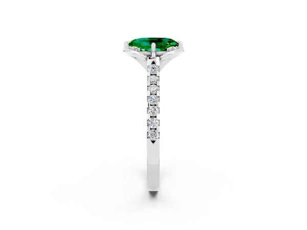 Silver Oval Cut Emerald Ring with Pavé Band and Floral Prong Setting