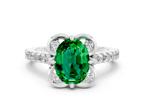 White gold Oval Cut Emerald Ring with Pavé Band and Floral Prong Setting