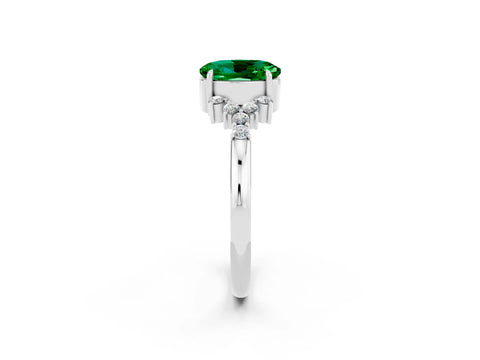 White gold Oval Cut Emerald Ring with Side Stones and Four-Prong Setting_98