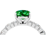 White gold Oval Cut Emerald Side Stone Solitaire Ring with Round  and Four-Prong Setting_52