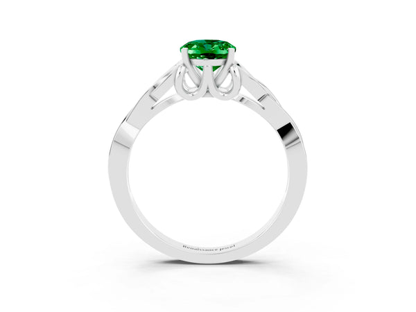 Silver Oval Cut Emerald Solitaire Celtic Knot Ring with Four-Prong Setting