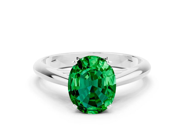 White gold Oval Cut Emerald Solitaire Engagement Ring with Cathedral Setting and Four-Prong Mount
