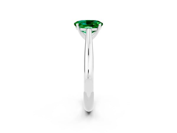 White gold Oval Cut Emerald Solitaire Engagement Ring with Cathedral Setting and Four-Prong Mount