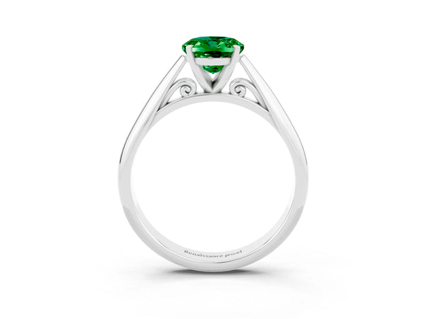 White gold Oval Cut Emerald Solitaire Engagement Ring with Cathedral Setting and Four-Prong Mount