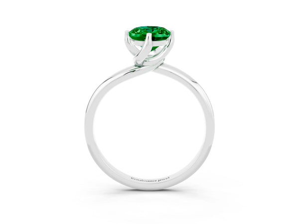 Silver Oval Cut Emerald Solitaire Engagement Ring with Four-Prong Setting and Classic Band
