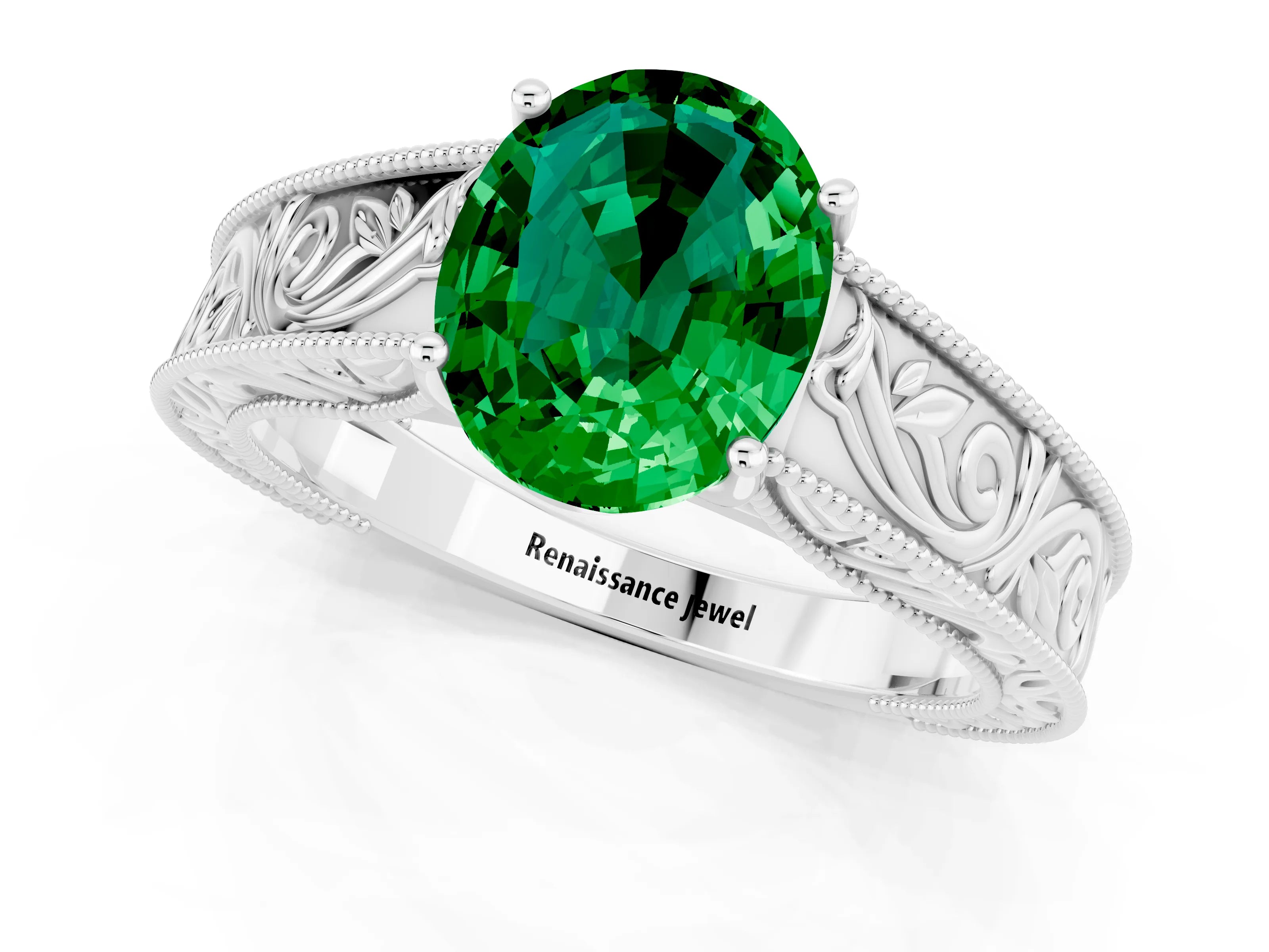 White gold Oval Cut Emerald Solitaire Ring with Engraved Band and Four-Prong Setting_1