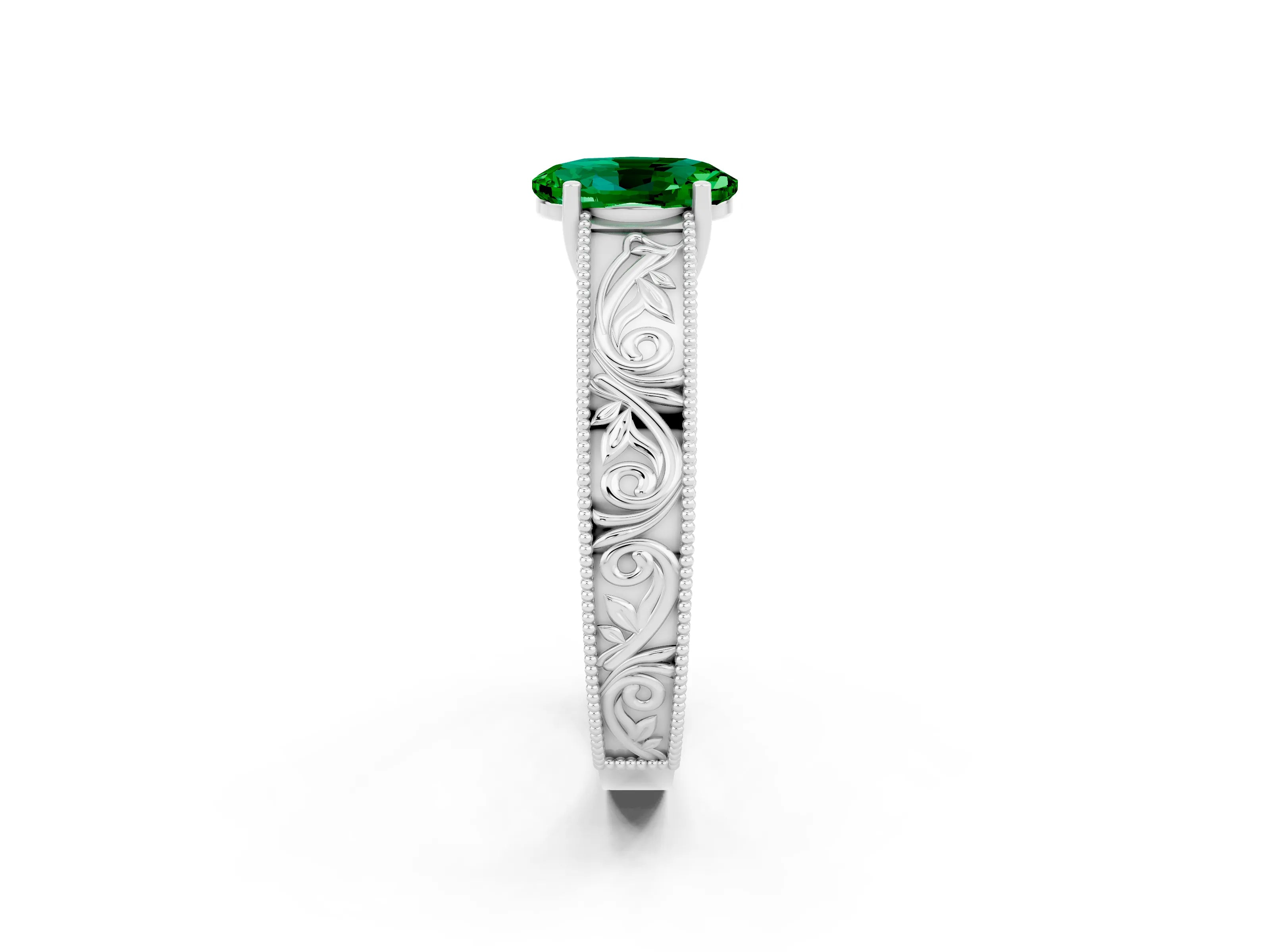White gold Oval Cut Emerald Solitaire Ring with Engraved Band and Four-Prong Setting_2