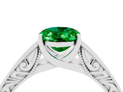 White gold Oval Cut Emerald Solitaire Ring with Engraved Band and Four-Prong Setting_4