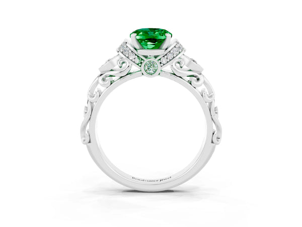 Platinum Oval Cut Emerald Solitaire Ring with Filigree Band and Four-Prong Setting