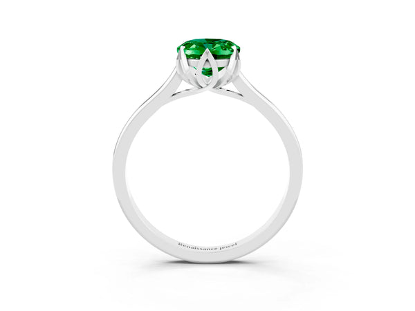 Platinum Oval Cut Emerald Solitaire Ring with Flower Prong Setting and Classic Band