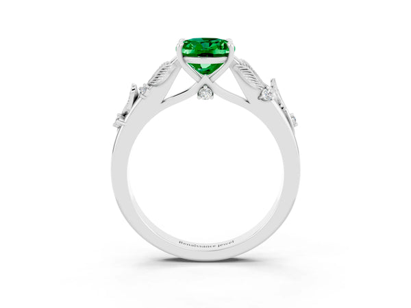 White gold Oval Cut Emerald Solitaire Ring with Leaf Motif Band and Four-Prong Setting