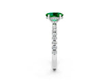 White gold Oval Cut Emerald Solitaire Ring with Pavé Band and Four-Prong Setting_26
