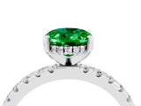 White gold Oval Cut Emerald Solitaire Ring with Pavé Band and Four-Prong Setting_28