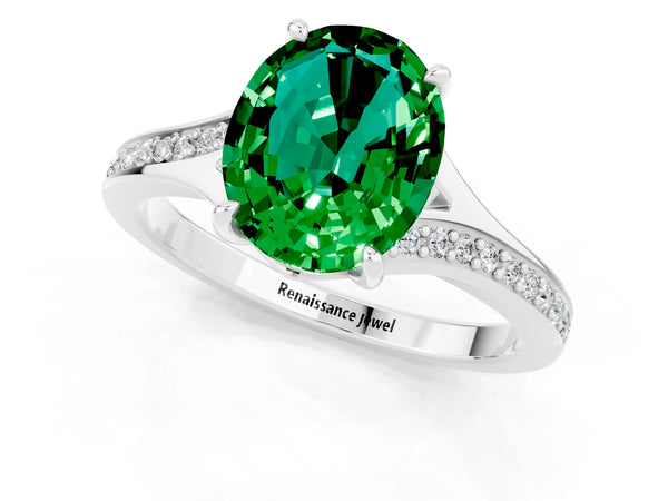 Silver Oval Cut Emerald Solitaire Ring with Pavé Band and Prong Setting