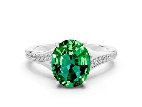 White gold Oval Cut Emerald Solitaire Ring with Pavé Band and Prong Setting