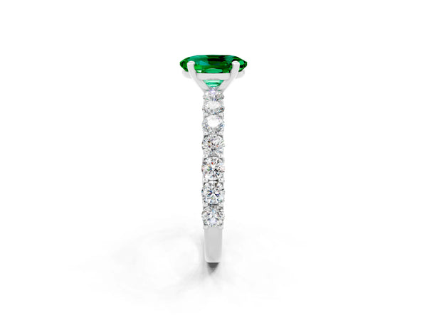 Silver Oval Cut Emerald Solitaire Ring with Shared Prong Pavé Band and Four-Prong Setting