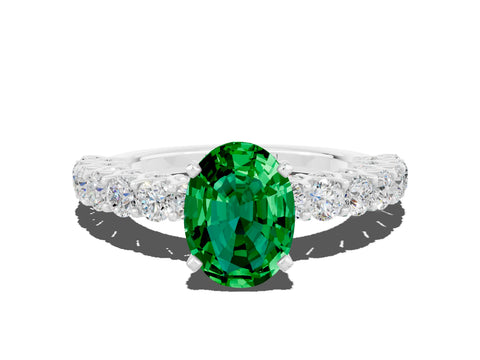 White gold Oval Cut Emerald Solitaire Ring with Shared Prong Pavé Band and Four-Prong Setting