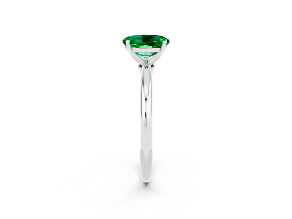 Platinum Oval Cut Emerald Solitaire Ring with Six-Prong Setting and Classic Band