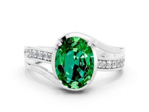 White gold Oval Cut Emerald Solitaire Ring with Split Shank and Prong Setting