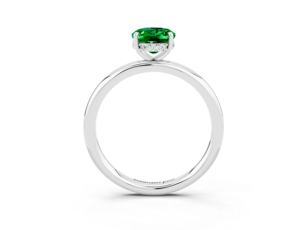 White gold Oval Cut Emerald Solitaire Ring with Thin Band and Four-Prong Setting