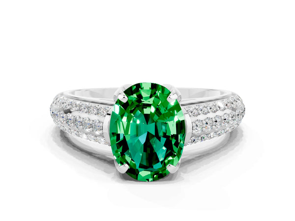 Silver Oval Cut Emerald Solitaire Ring with Three-Row Pavé Band and Four-Prong Setting