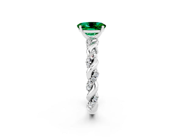 Platinum Oval Cut Emerald Solitaire Ring with Twisted Band and Pavé Accents