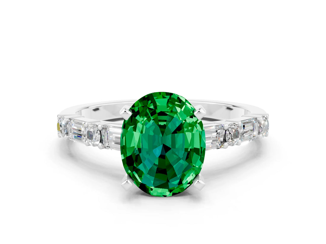 White gold Oval Cut Emerald Solitaire with Side Baguettes and Channel Set Band