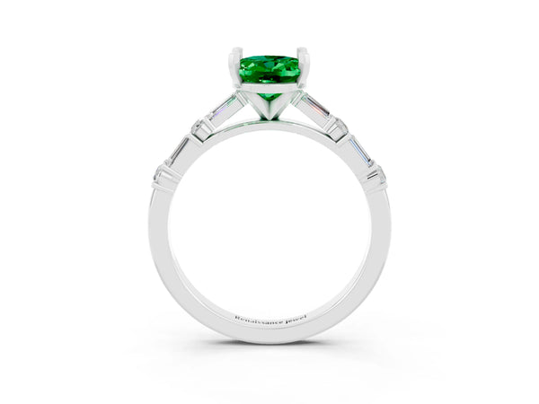 Platinum Oval Cut Emerald Solitaire with Side Baguettes and Channel Set Band