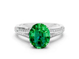 White gold Oval Cut Emerald Split Shank Engagement Ring with Pavé Band