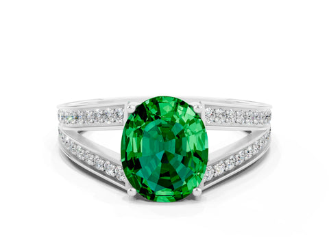 White gold Oval Cut Emerald Split Shank Ring with Pavé Band and Four-Prong Setting