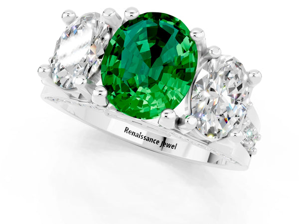 Platinum Oval Cut Emerald Three-Stone Ring with Channel Set Band and Four-Prong Setting