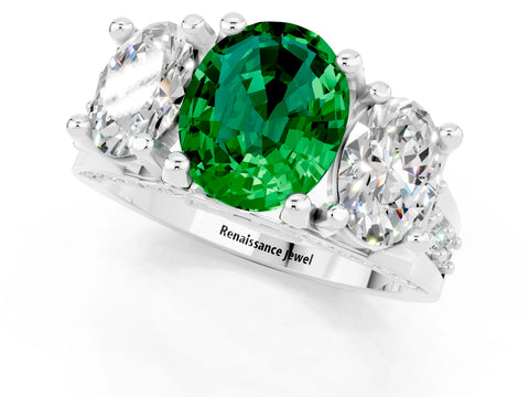 White gold Oval Cut Emerald Three-Stone Ring with Channel Set Band and Four-Prong Setting_1