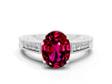 White gold Oval Cut Garnet Engagement Ring with Milgrain Channel Set Band and Prong Setting