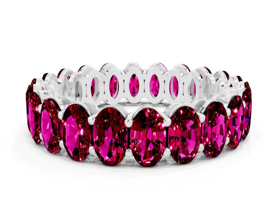 White gold Oval Cut Garnet Eternity Band with Shared Prong Setting