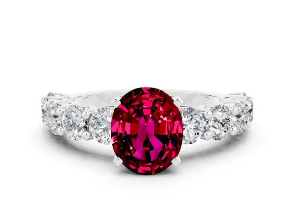 White gold Oval Cut Garnet Prong Setting with Side Stones on a Pave Band