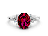 White gold Oval Cut Garnet Ring with Side Stones and Four-Prong Setting_96