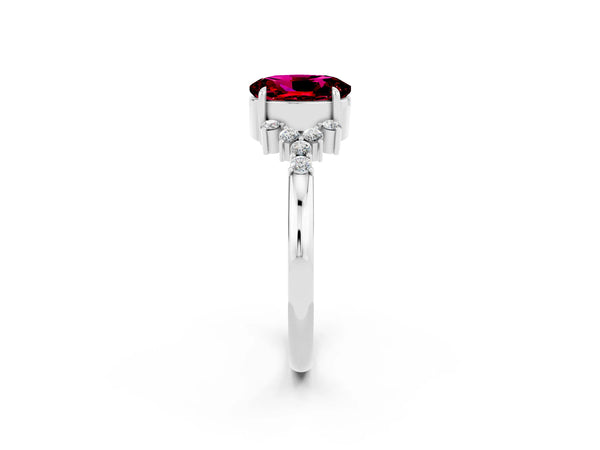 Silver Oval Cut Garnet Ring with Side Stones and Four-Prong Setting