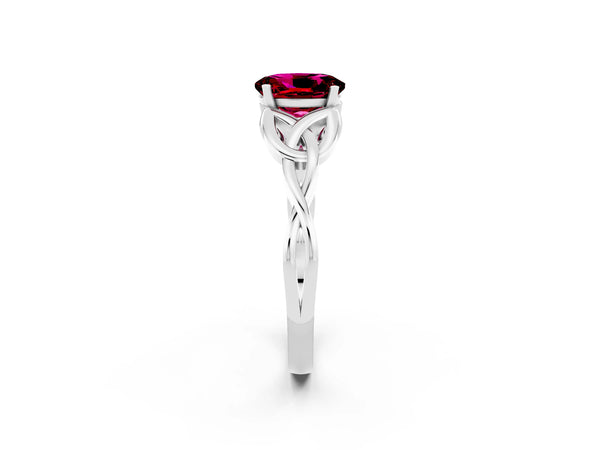 Silver Oval Cut Garnet Solitaire Engagement Ring with Celtic Knot Band and Four-Prong Setting