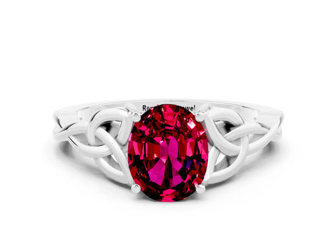 White gold Oval Cut Garnet Solitaire Engagement Ring with Celtic Knot Band and Four-Prong Setting