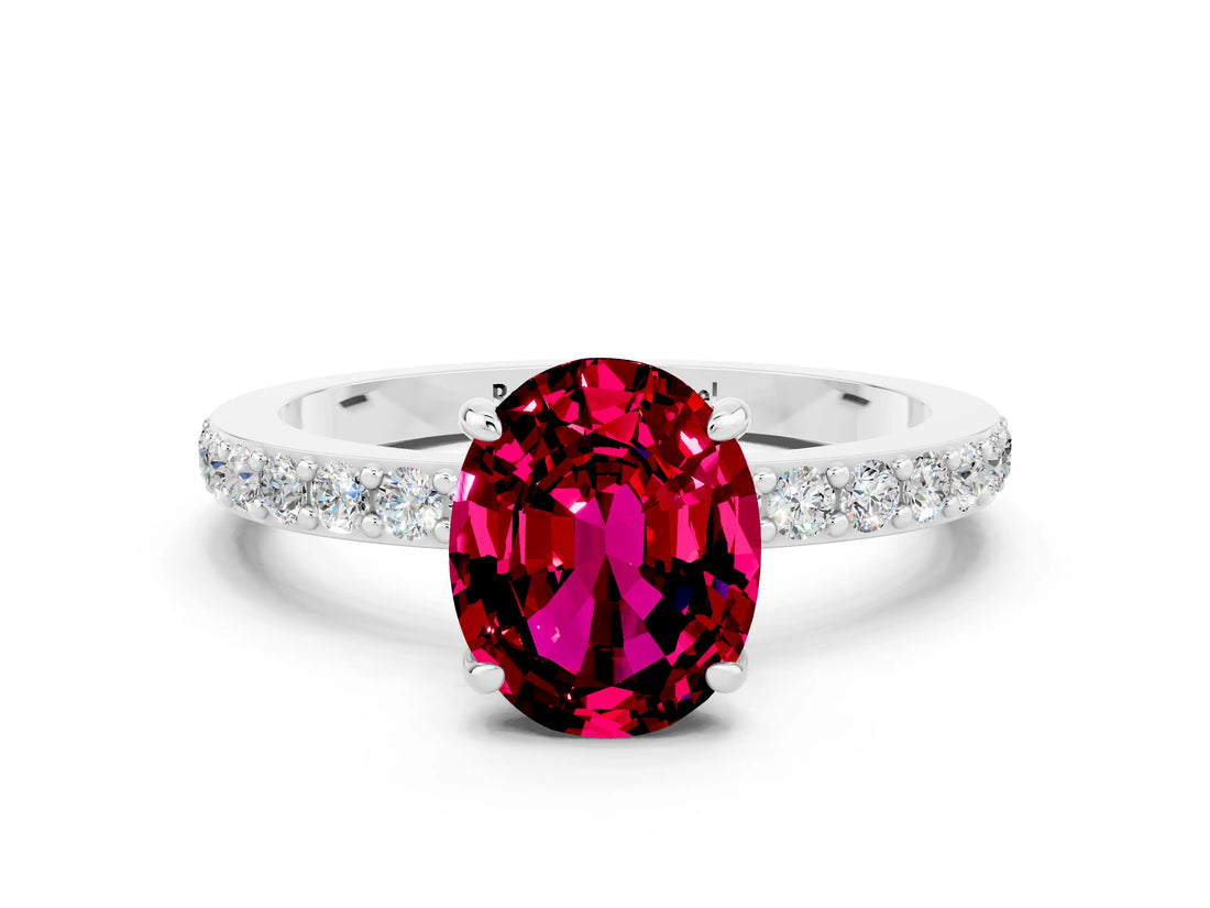 White gold Oval Cut Garnet Solitaire Engagement Ring with Pavé Band and Four-Prong Setting