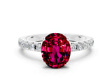 White gold Oval Cut Garnet Solitaire Pavé Band with Four-Prong Setting